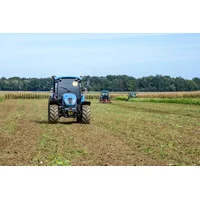 Text: Tractors during soil cultivation