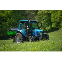 LS MT5 with a manure spreader by Hofman