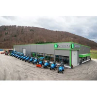 LS tractors in front of the Lagerhof store in Podplat