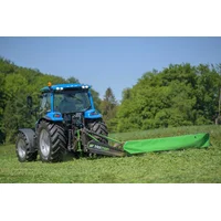 LS tractor with mowing using a Hofman mower