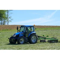 Text: Modern tractor on the lawn