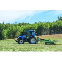 Text: LS tractor with Hofman tedder